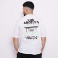 T-shirt oversize en coton 100% – 180g Ultra confortable et stylé, avec un petit motif à l'avant et une impression marquante dans le dos. Parfait pour un look affirmé au quotidien.